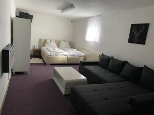 Posteľ alebo postele v izbe v ubytovaní Apartmány Nad Rybníkem