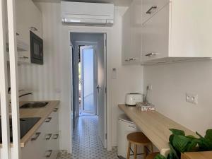 Kuchyň nebo kuchyňský kout v ubytování Les Suites de Vanves - Parc des expositions Porte de Versailles