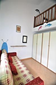 A bed or beds in a room at Zennova #23 Nikiti Family Green Nest