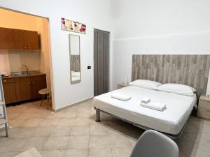 A bed or beds in a room at Marilù