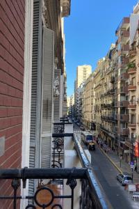 a view of a city street from a balcony at Hotel Americano in Buenos Aires