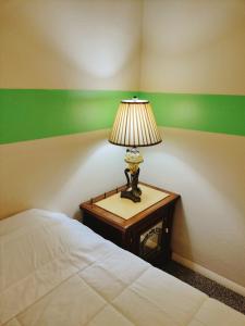 Posteľ alebo postele v izbe v ubytovaní Golden Sunflower's Apartment E