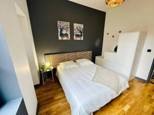 Posteľ alebo postele v izbe v ubytovaní F2 Cosy Place Jean Jaurès