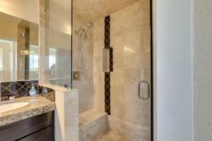 a bathroom with a shower and a sink at 3 Mi to Casinos Reno Home with Fenced Yard! in Reno +19 photos