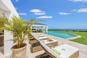an image of a villa with a swimming pool at Villa Ambiance in Marigot