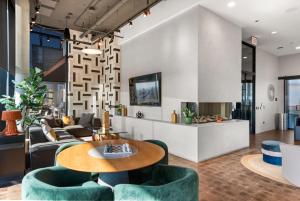 A seating area at Avra Stylish Apartments Prime West Loop Location Near Union Park