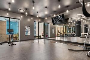 The fitness centre and/or fitness facilities at Avra Stylish Apartments Prime West Loop Location Near Union Park