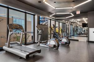 The fitness centre and/or fitness facilities at Avra Stylish Apartments Prime West Loop Location Near Union Park