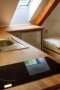 Postel nebo postele na pokoji v ubytování Apartmán Pod Zámkem