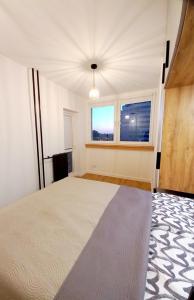 Posteľ alebo postele v izbe v ubytovaní NeoApartments Lotnicza