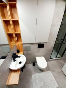 Kúpeľňa v ubytovaní NeoApartments Lotnicza