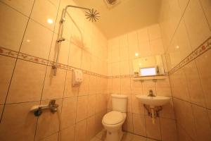 Koupelna v ubytování Goden Beach B&B + 17 fotografií