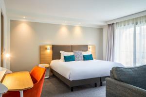 Кровать или кровати в номере Holiday Inn Perpignan by IHG