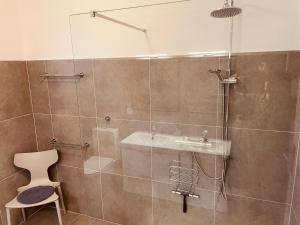 Koupelna v ubytování Haus Lana + 9 fotografií