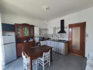 Kuchyň nebo kuchyňský kout v ubytování Stone Way Apartment