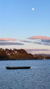 a dock in the middle of a large body of water at Madla , hybel in Stavanger