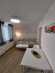Posedenie v ubytovaní Sweet & Cosy Αpartment in Chora's old town