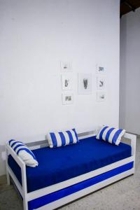 Postel nebo postele na pokoji v ubytování Cabaña Perla Azul + 37 fotografií