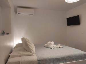 Posteľ alebo postele v izbe v ubytovaní Sweet & Cosy Αpartment in Chora's old town