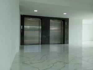 two glass elevators in a building with a marble floor at Vizinho ao Shopping Caruaru Cobertura 14 andar in Caruaru