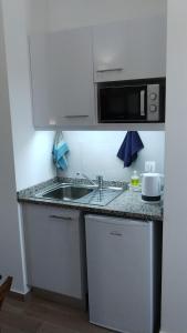 A cozinha ou cozinha compacta de Quinta do Oratório Agroturismo