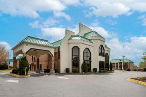 a large white building with a green roof at Best Western Statesville Inn in Statesville