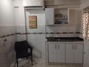 Dapur atau dapur kecil di El Hogar de Ami