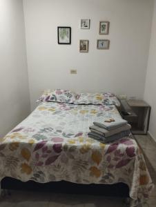 Katil atau katil-katil dalam bilik di El Hogar de Ami