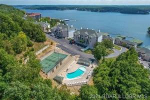 an aerial view of a house with a swimming pool at Rare GEM @Emerald Bay - Smart Home - THAT VIEW!!! in Lake Ozark
