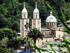 a large building with domes on top of a mountain at Descanso y Confort 3 Luxury in La Tebaida