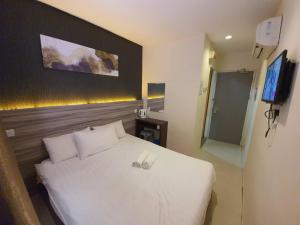 Letto o letti in una camera di One Point Hotel
