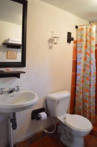 Ванная комната в Finca Cantaclaro