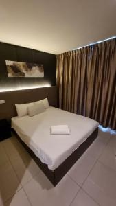 Letto o letti in una camera di One Point Hotel