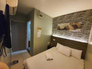 Letto o letti in una camera di One Point Hotel