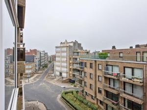 an aerial view of a city street with buildings at El Kantara 402 sunny one bedroom apartment a few steps from the sea in Koksijde