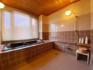 Koupelna v ubytování Hotel Gyokusen