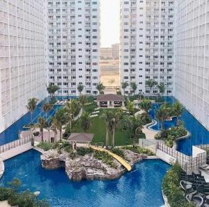 an aerial view of a resort with a water park at Shore Residences in Manila
