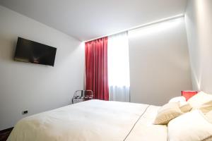 Łóżko lub łóżka w pokoju w obiekcie Italianflat - Arena di Verona Apartments