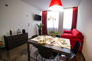 A television and/or entertainment centre at Italianflat - Arena di Verona Apartments