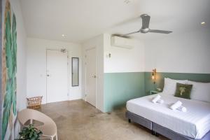 Łóżko lub łóżka w pokoju w obiekcie Boutique Hotel JT Curaçao