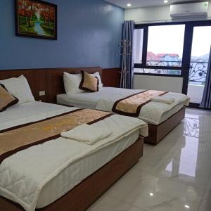 Krevet ili kreveti u jedinici u okviru objekta Bảo An hotel Đảo Quan Lạn