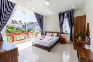 Voodi või voodid majutusasutuse Đà Lạt Cao Nguyên Hotel toas