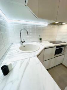 Køkken eller tekøkken på Apartment ЖД вокзал, Центр