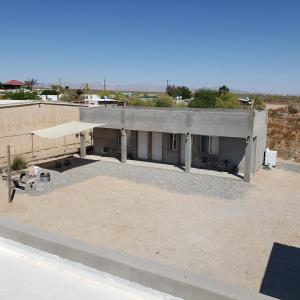 a building in the middle of a desert at Baja's Rest Stop in San Felipe