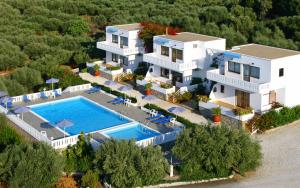 an aerial view of a villa with a swimming pool at Villas Michalis in Chorafakia