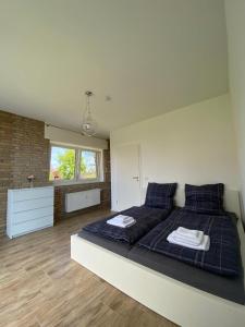 Postel nebo postele na pokoji v ubytování Appartement 4 Personen - Zimmer in Wohnung, zentral, ruhig, modern