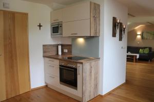 Kuchyň nebo kuchyňský kout v ubytování Ferienwohnung am Dreiseithof
