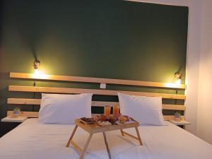 Postel nebo postele na pokoji v ubytování Local Paradise Xilokastro