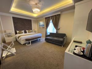 Voodi või voodid majutusasutuse Remaj Hotel toas