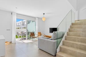 Posezení v ubytování MEDANO4YOU Beachwalk Holiday Home